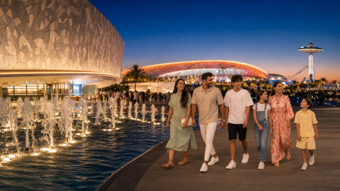 Families enjoying an Abu Dhabi summer weekend at a modern waterfront destination